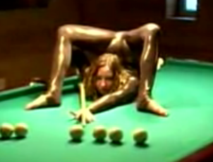 Flexible Chick Plays Pool